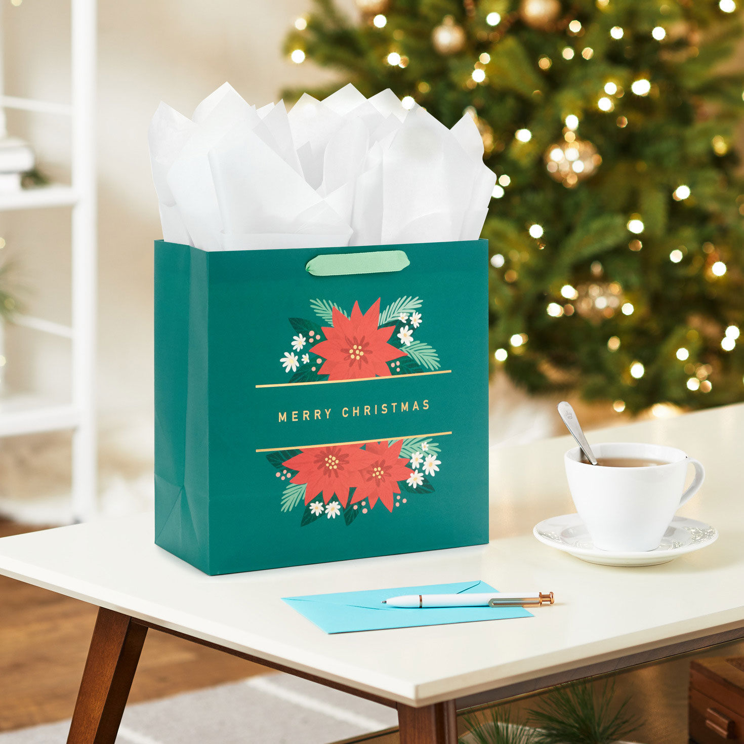 Poinsettias Large Square Christmas Gift Bag In Use image number 2