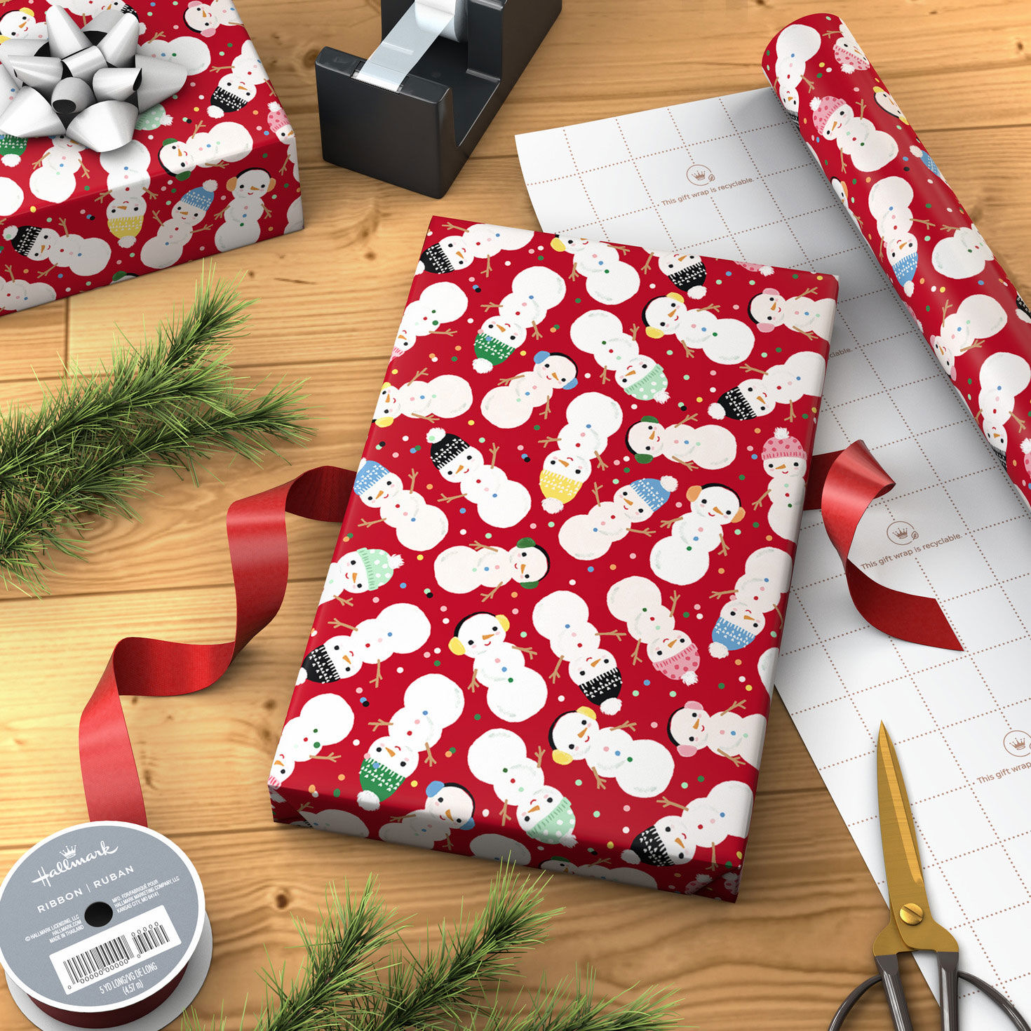 Snow Kiddos on Red Jumbo Holiday Wrapping Paper Roll in use image number 3