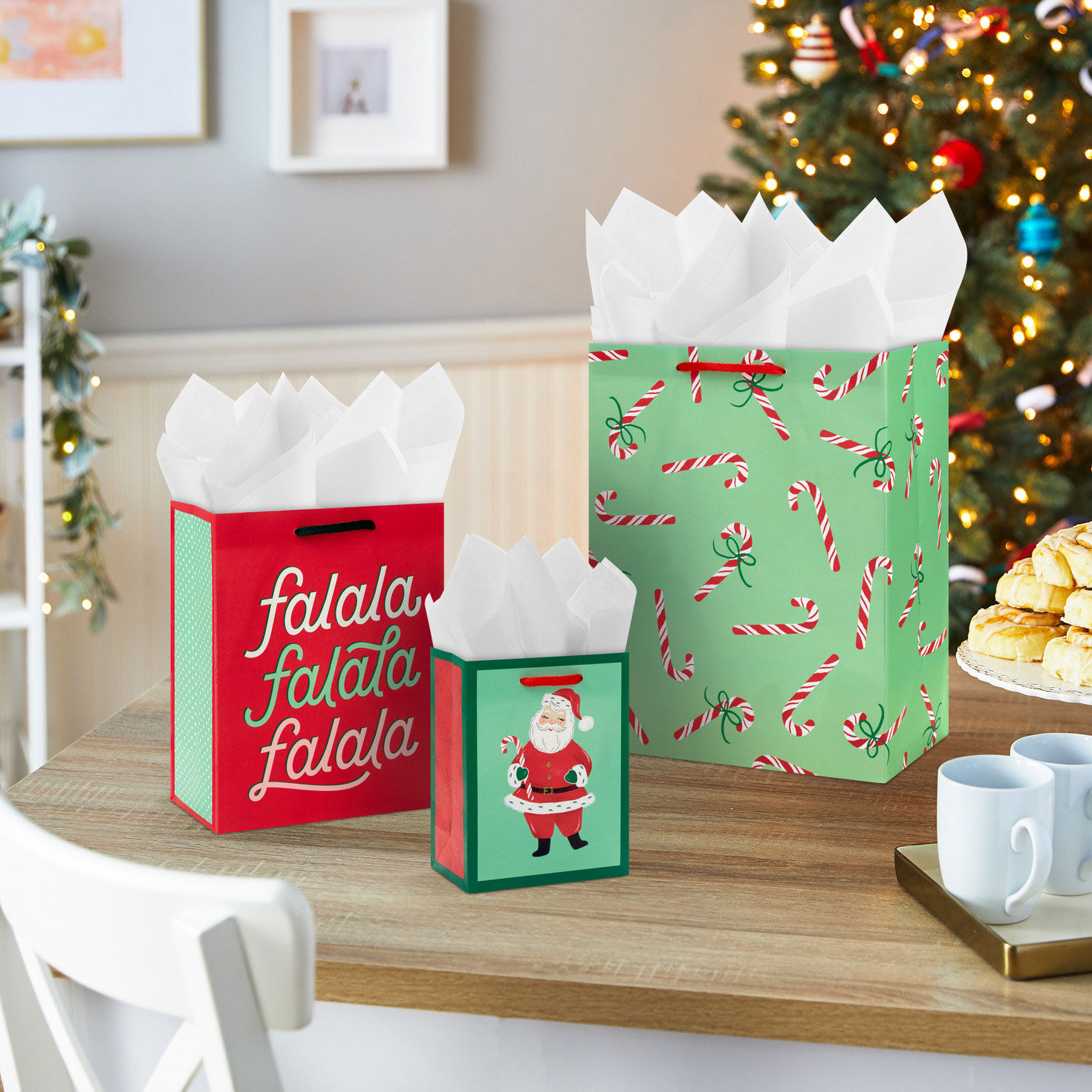 Let's Get Merry 8-Pack Assortment Christmas Gift Bag Bundle in use image number 2