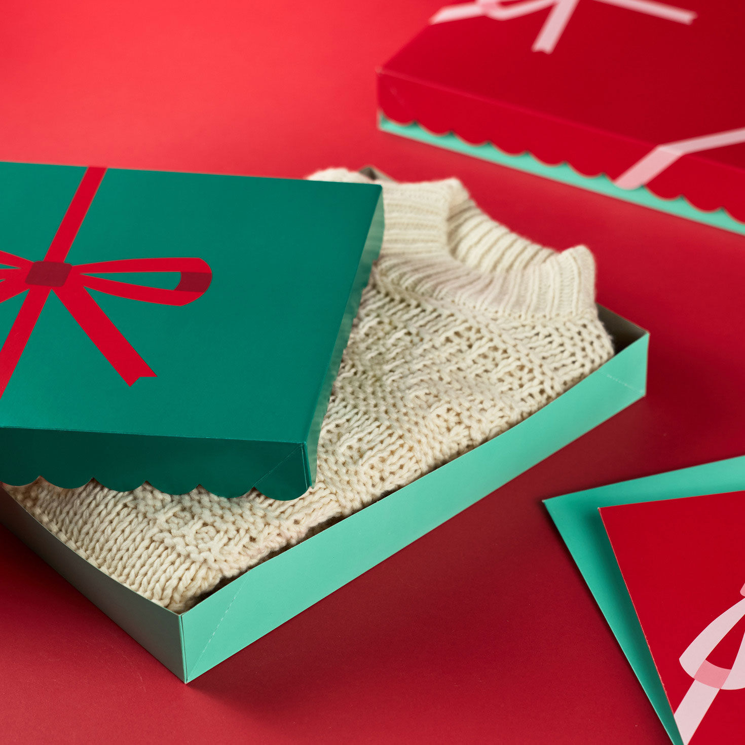 Red and Green with Bows Holiday Gift Boxes in use image number 2