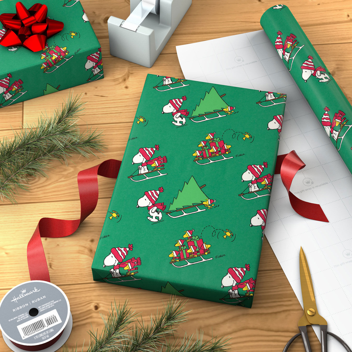 Sledding Snoopy on Green Holiday Gift Wrap Roll in use image number 3