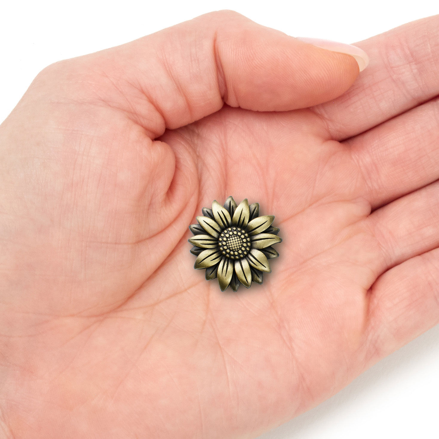 Bloom and Grow Flower Antiqued Metal Pocket Token item on hand image number 4