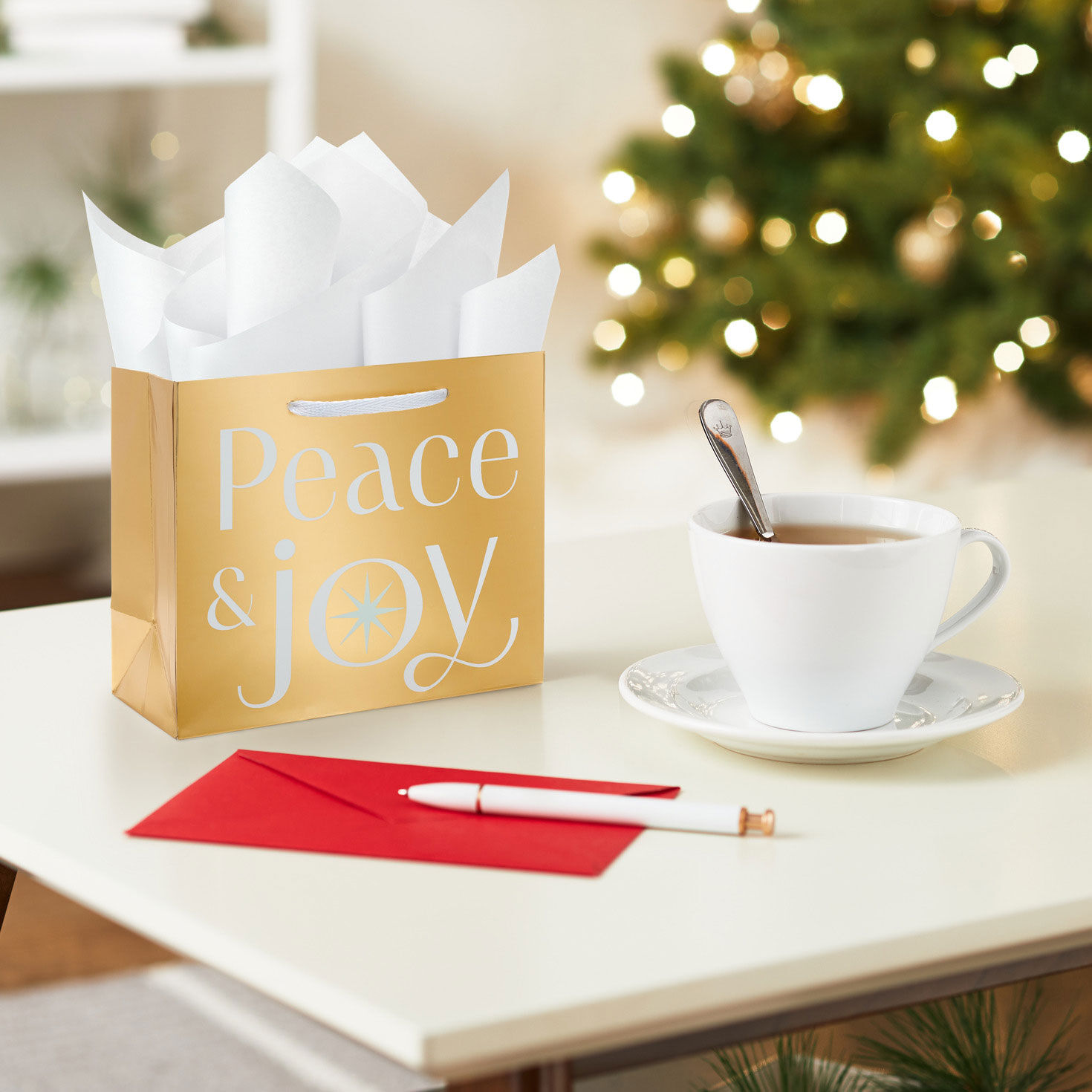 Peace and Joy Small Holiday Gift Bag In use image number 2