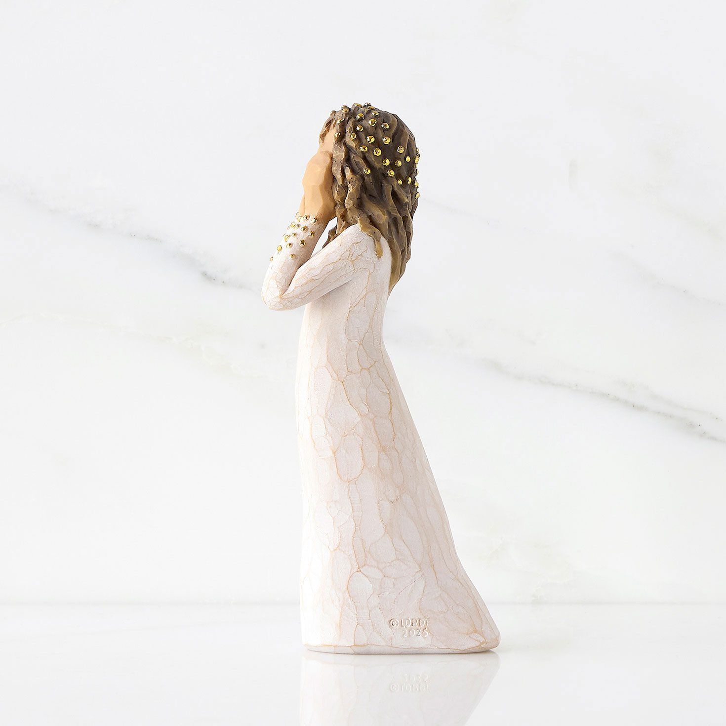 Girl With Hands on Face and Gold Accents Figurine side image number 4