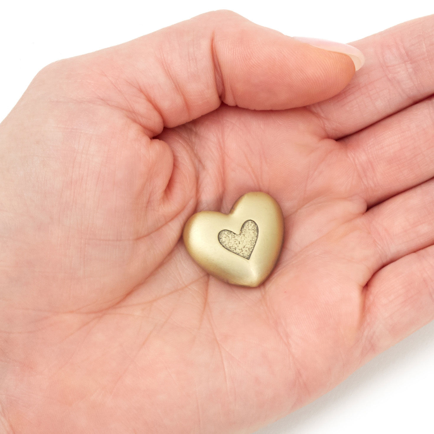 Heart-Shaped Metal Wishing Token hand holding item image number 3