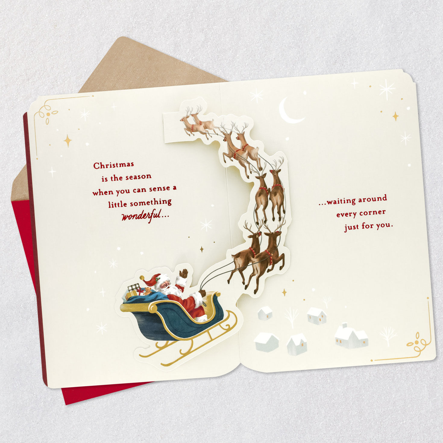 Burgundy Pop-Up Santa Storybook Christmas Card Open card with envelope image number 4