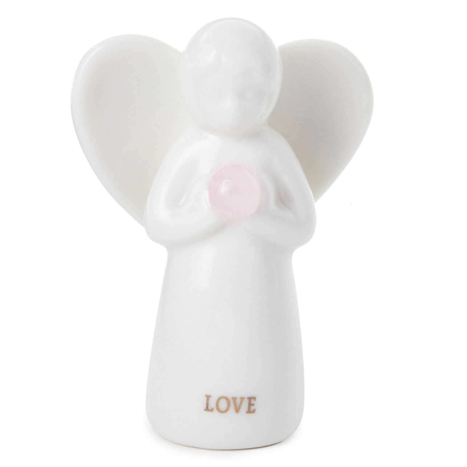 A white angel figurine holding a pink orb