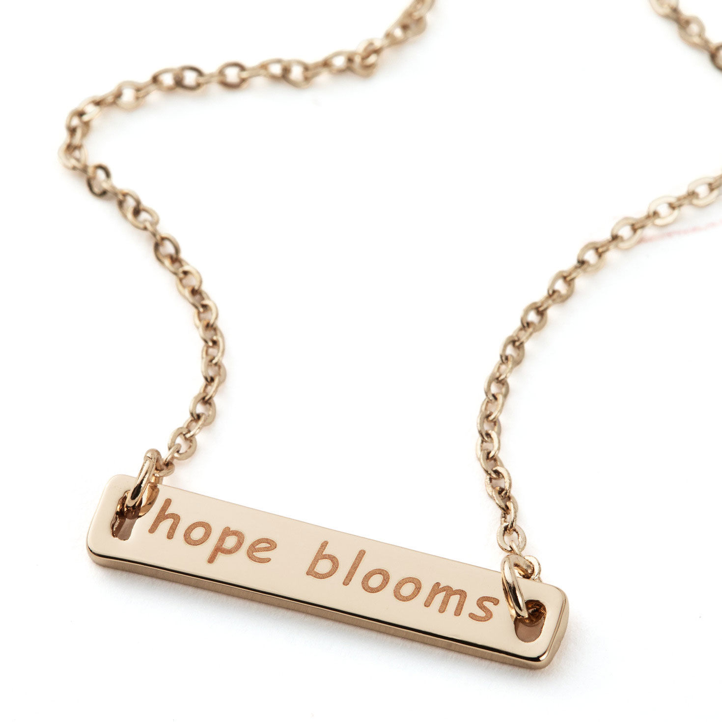 Bar Pendant With Quote on Gold Metal Chain closeup detail image number 5