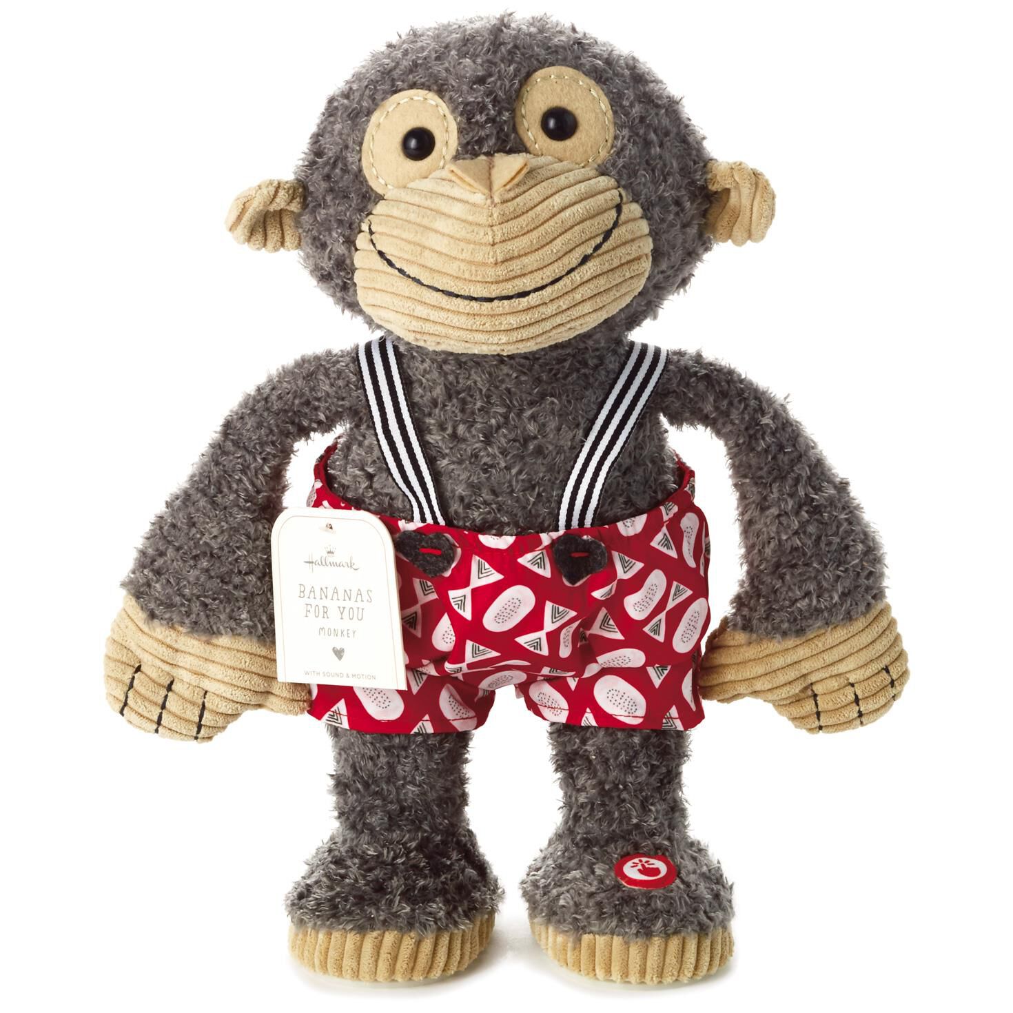 old stuffed monkey with banana
