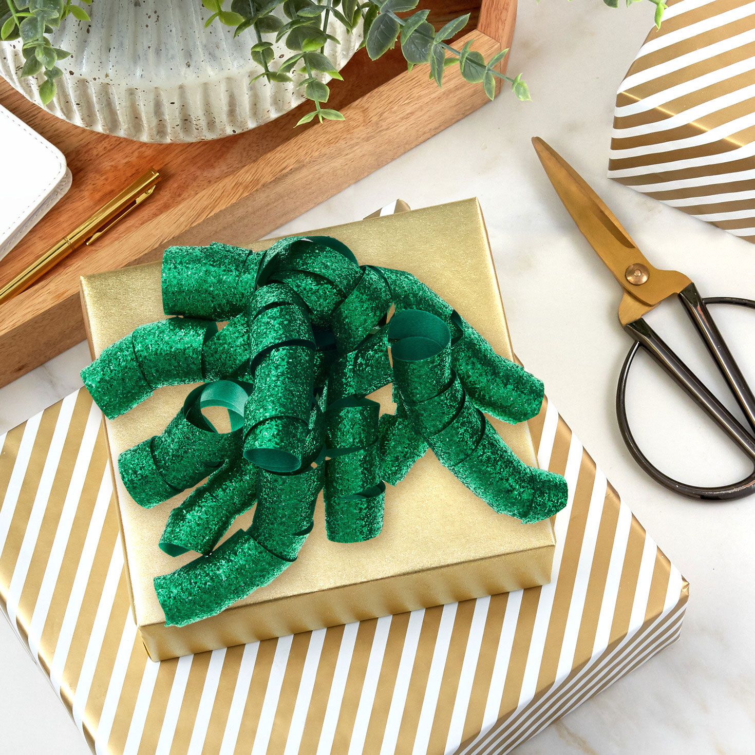 Sparkly Green Cascading Ribbon Holiday Gift Bow in use image number 2