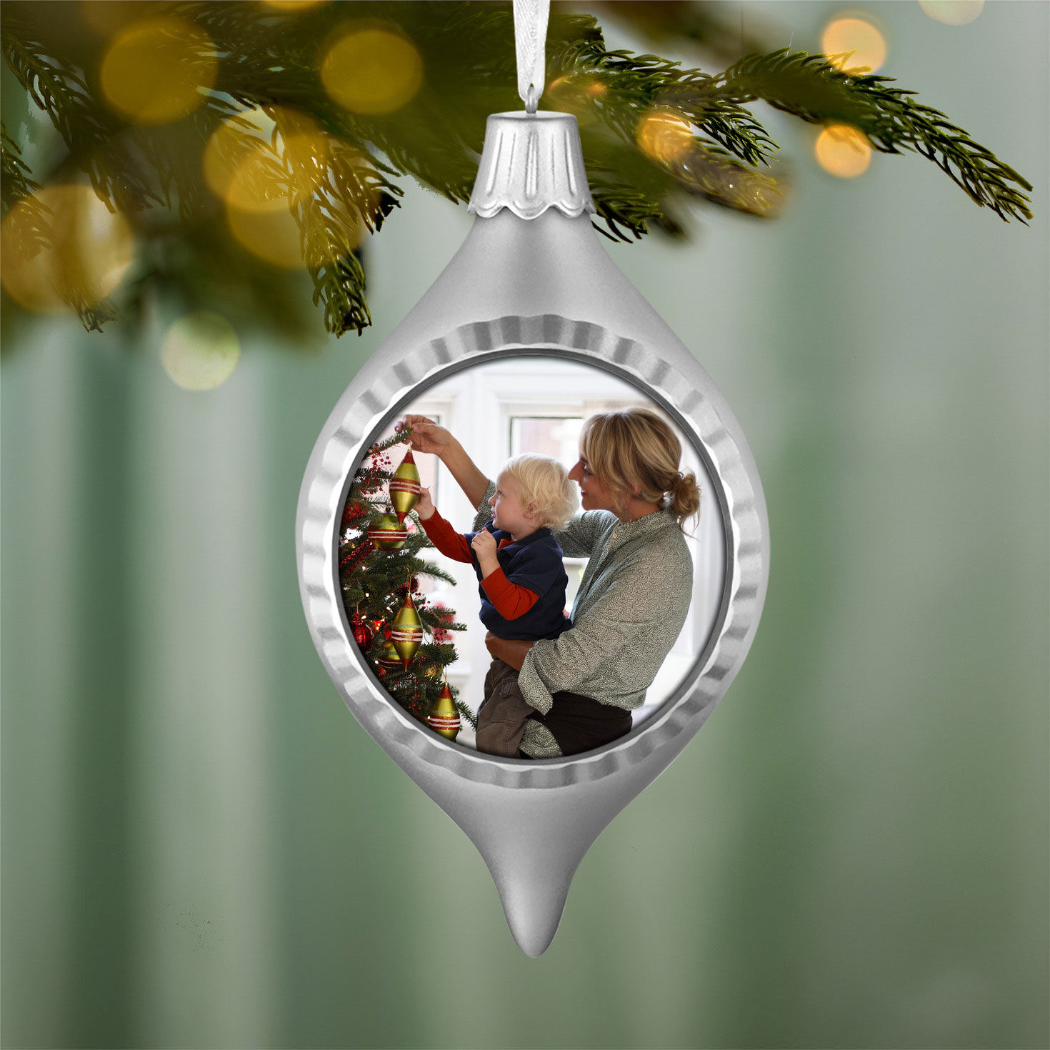 Silver Bauble Personalized Photo Ornament hanging on tree image number 2