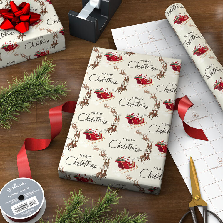 Reindeer and Sleigh Jumbo Christmas Gift Wrap Roll in use image number 3