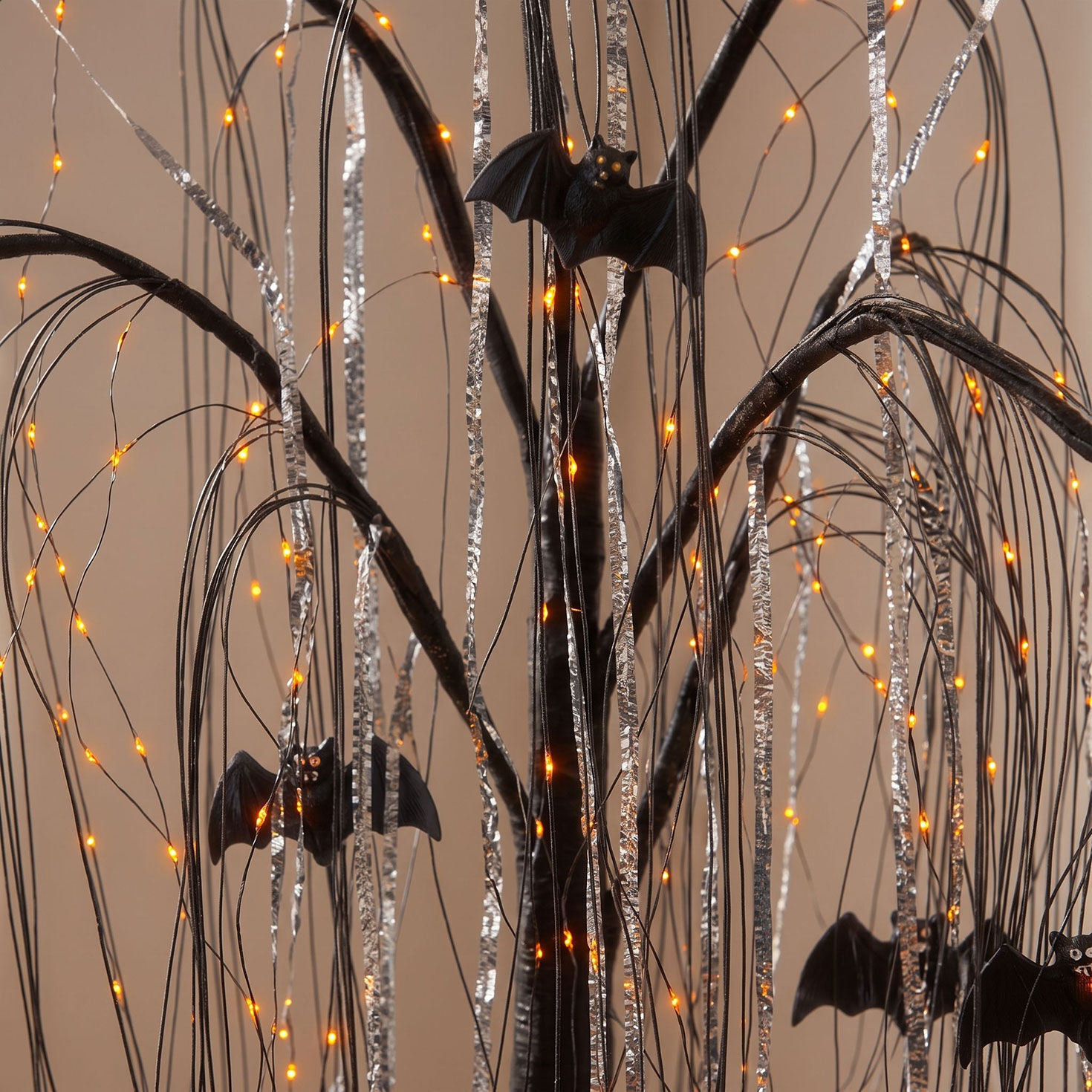 4 ft Electric Black Willow Halloween Tree with Bats and Orange Micro LEDs in use image number 3