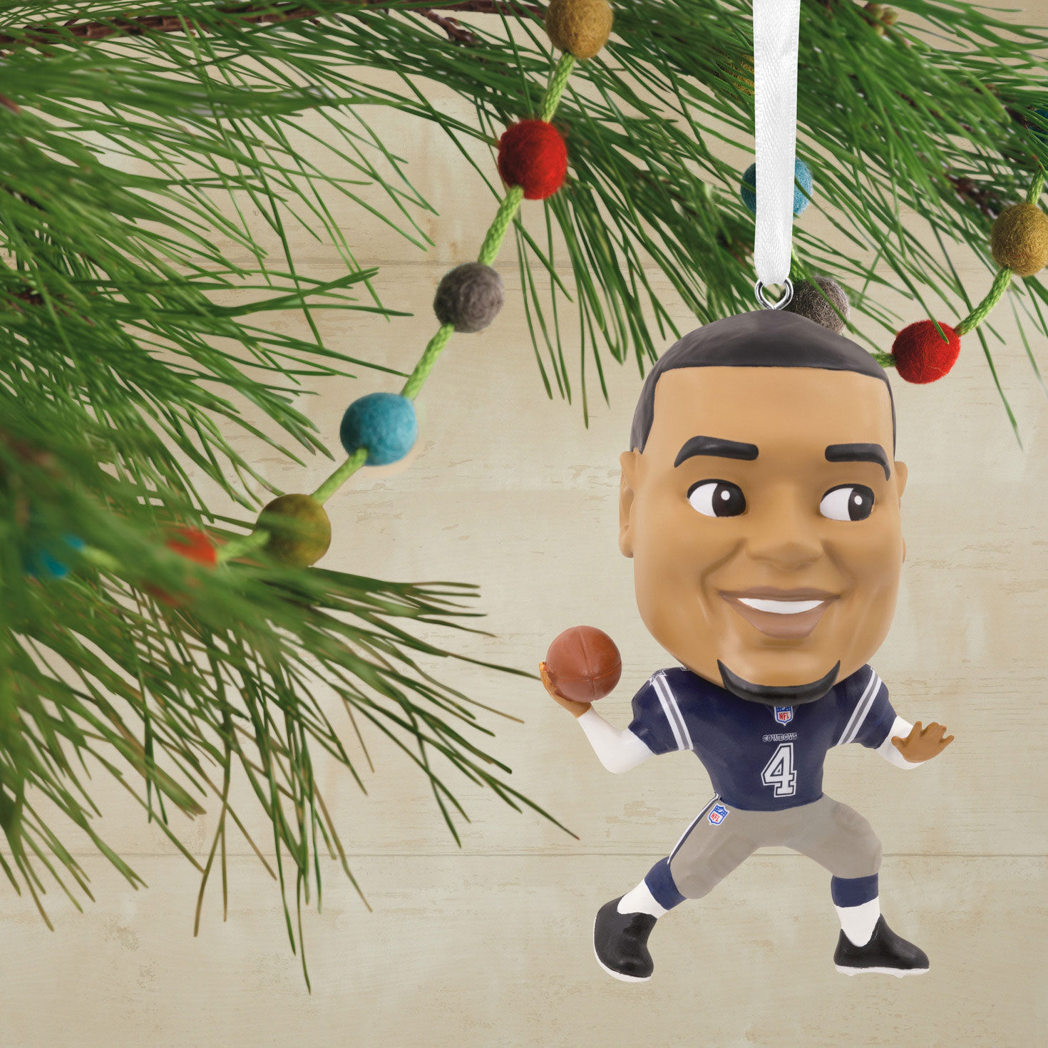 Dak Prescott Bobblehead Christmas Ornament hanging on tree image number 2