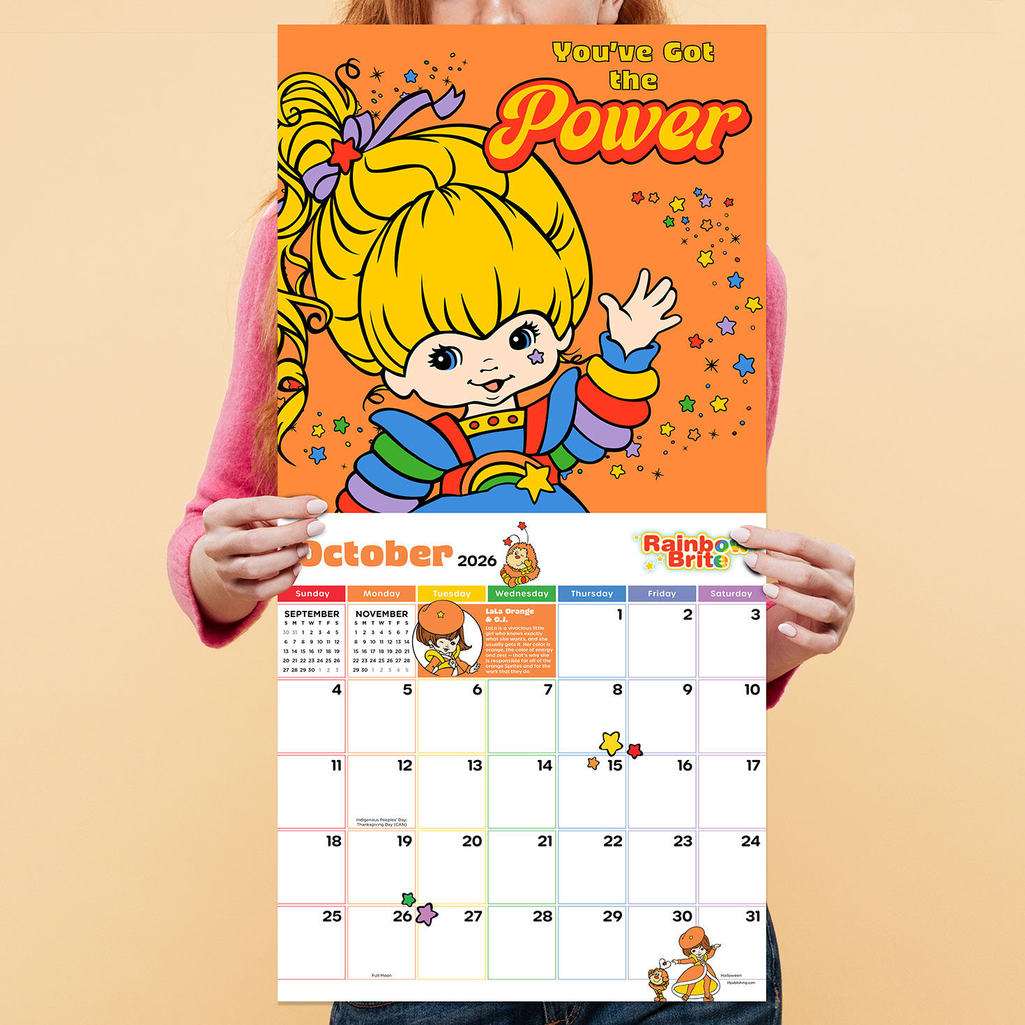 Rainbow Brite 2026 Wall Calendar hand holding item image number 3