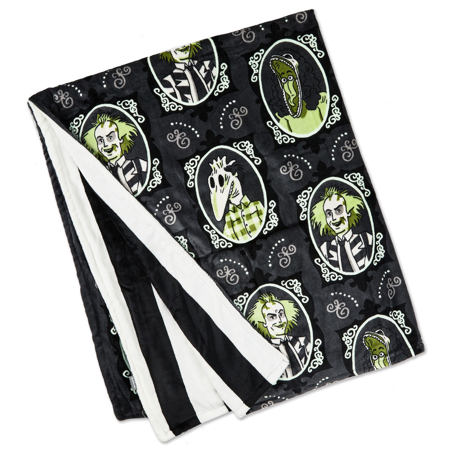 Beetlejuice&trade; Glow-in-the-Dark Throw Blanket folded glowing image number 2