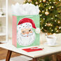 Retro Santa on Green Large Christmas Gift Bag In Use image number 2
