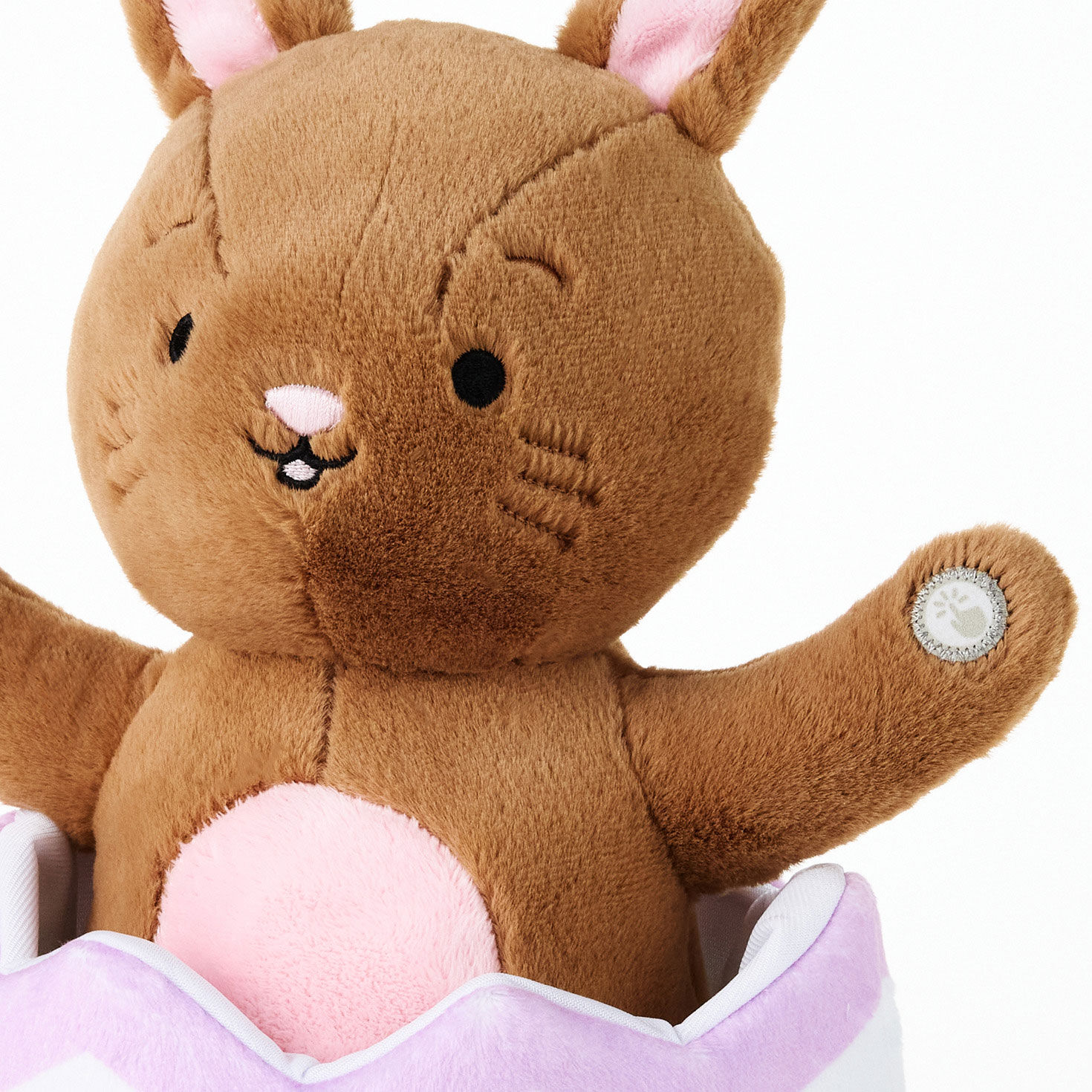 Brown Bunny in Easter Egg Singing and Spinning Plush upclose view image number 6