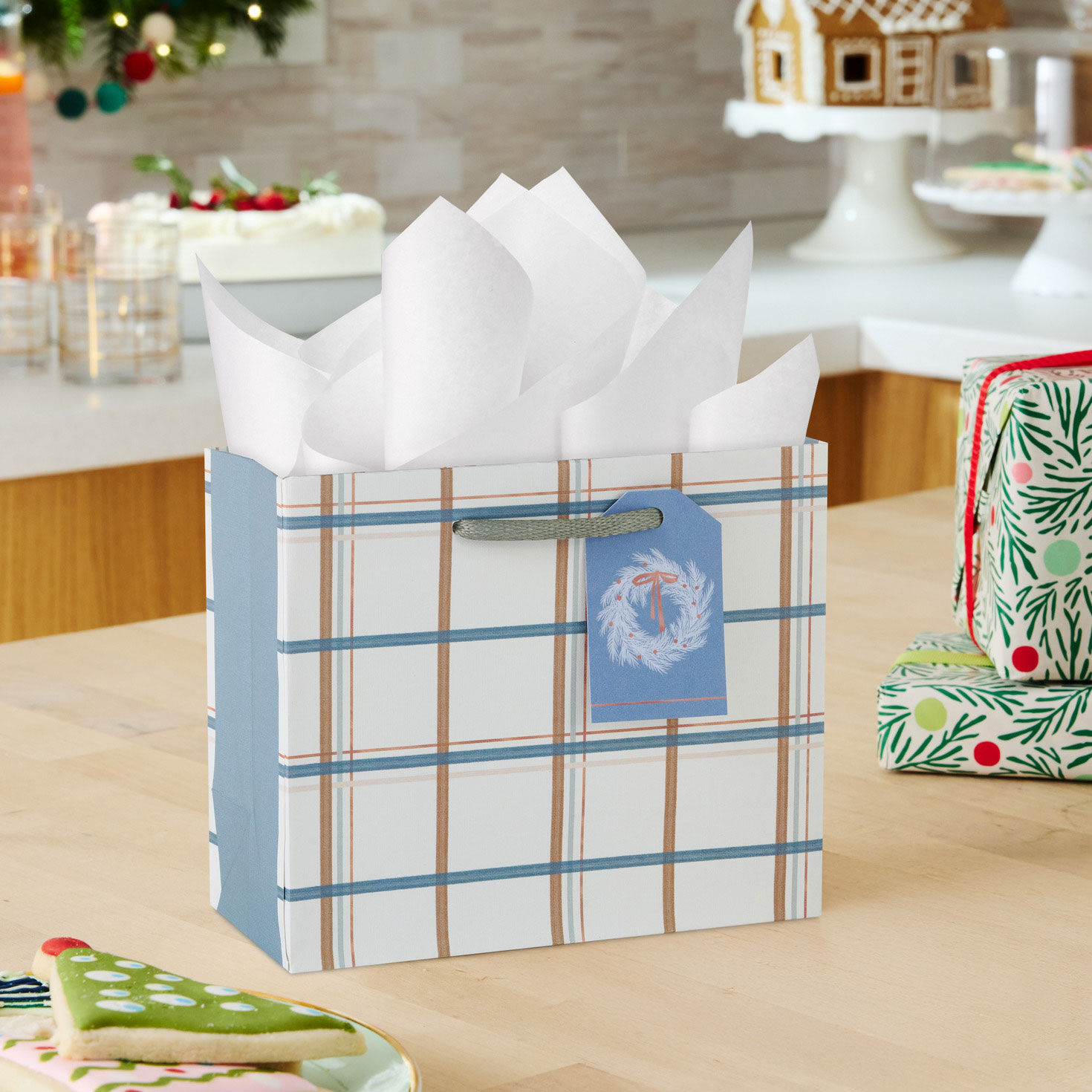 Rose Gold and Icy Blue Plaid Small Holiday Gift Bag in use image number 2