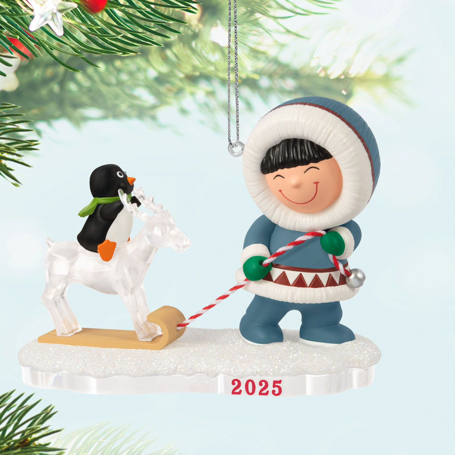 Eskimo Pulling Sled Keepsake Ornament Hanging on tree image number 2
