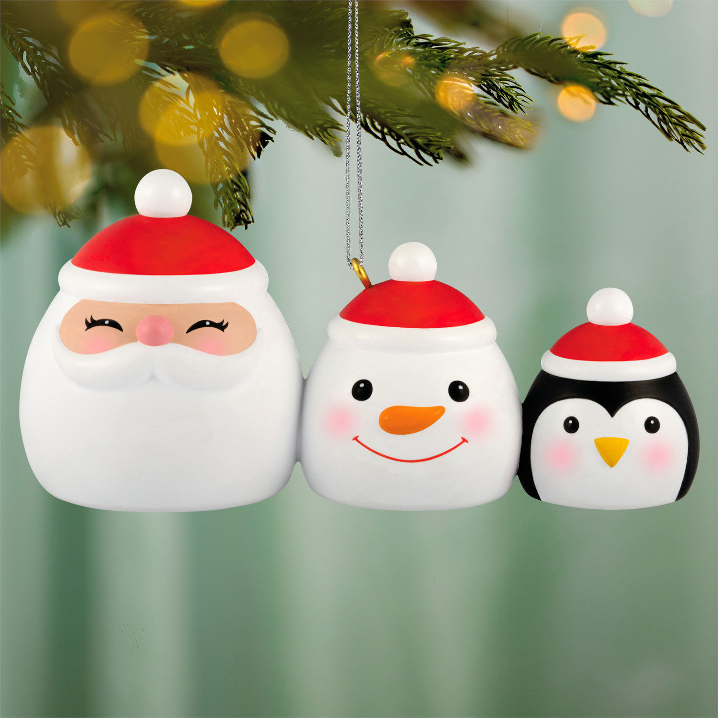Santa Snowman Penguin Canisters Keepsake Ornament hanging on tree image number 2