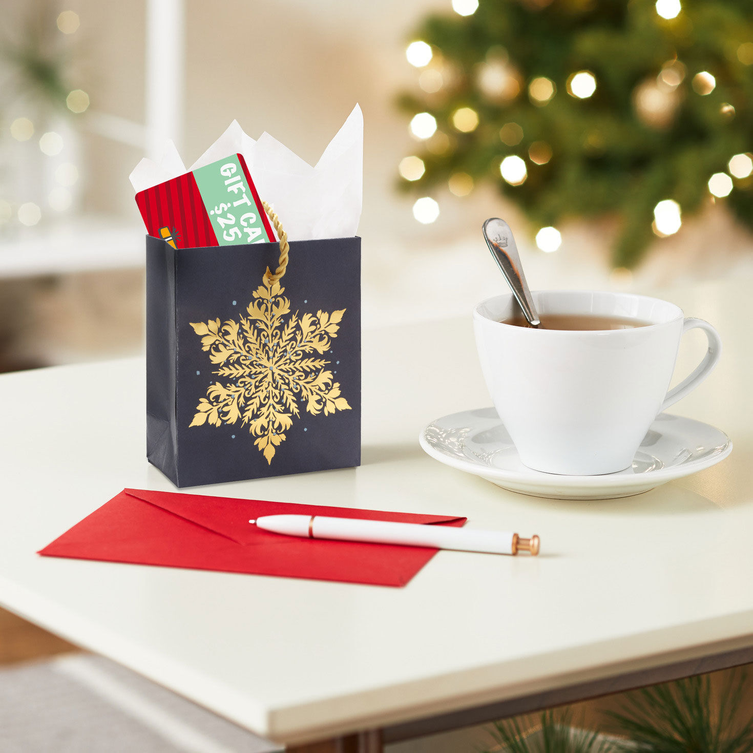 Gold Snowflake Holiday Gift Card Holder Bag In use image number 2