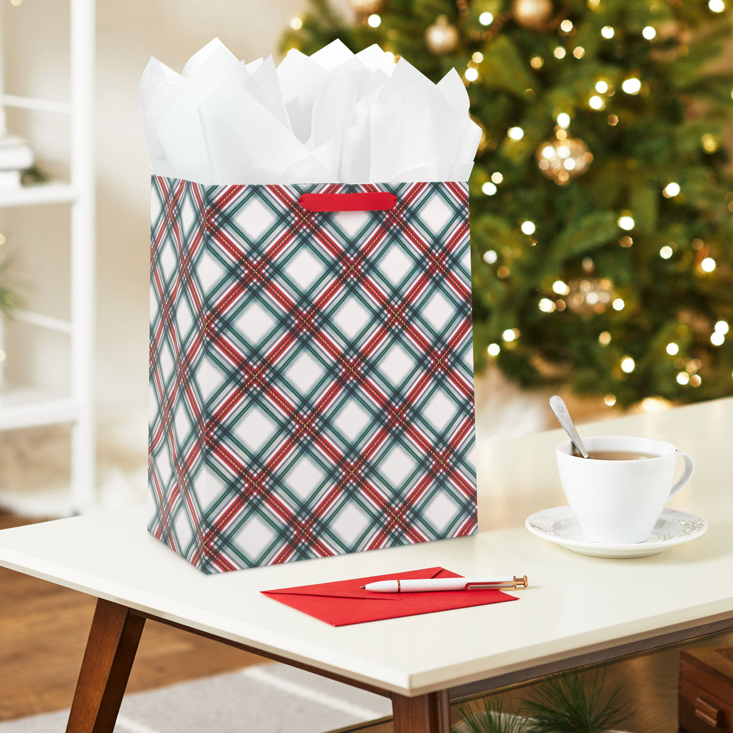 Festive Red and Green Plaid Large Holiday Gift Bag In Use image number 2