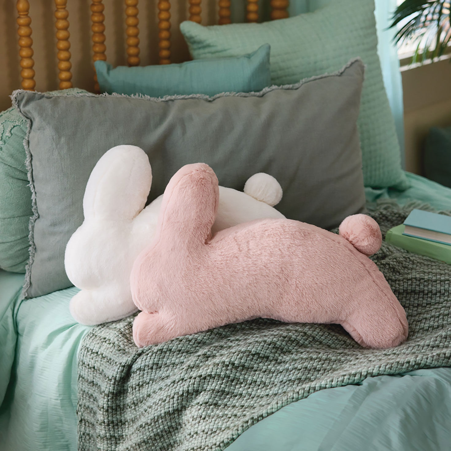 Bunny Shaped Pink Faux Fur Pillow Easter Decor in use image number 2