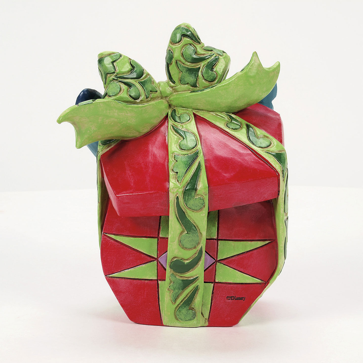 Jim Shore Stitch Popping Out of Gift Figurine back image number 2