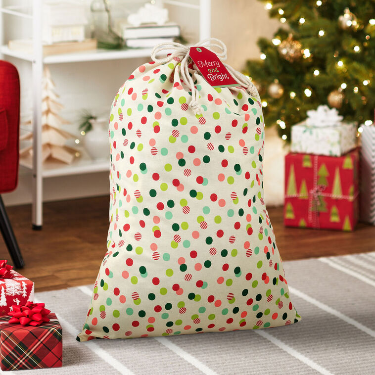 Merry and Bright Dots Christmas Fabric Gift Bag in use image number 2