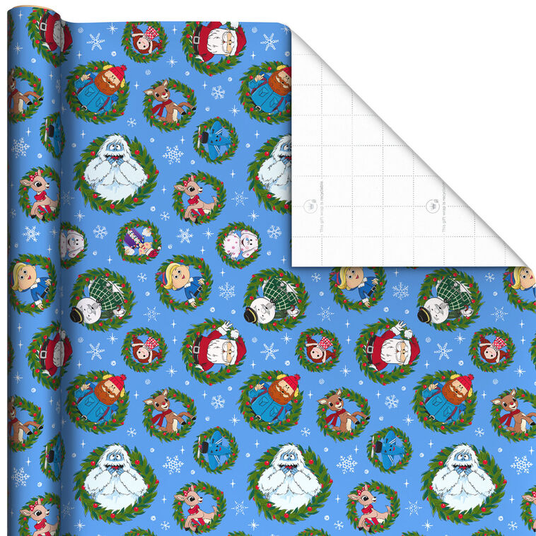 Rudolph the Red-Nosed Reindeer® Friends on Blue Wrapping Paper Roll, 25 sq. ft.