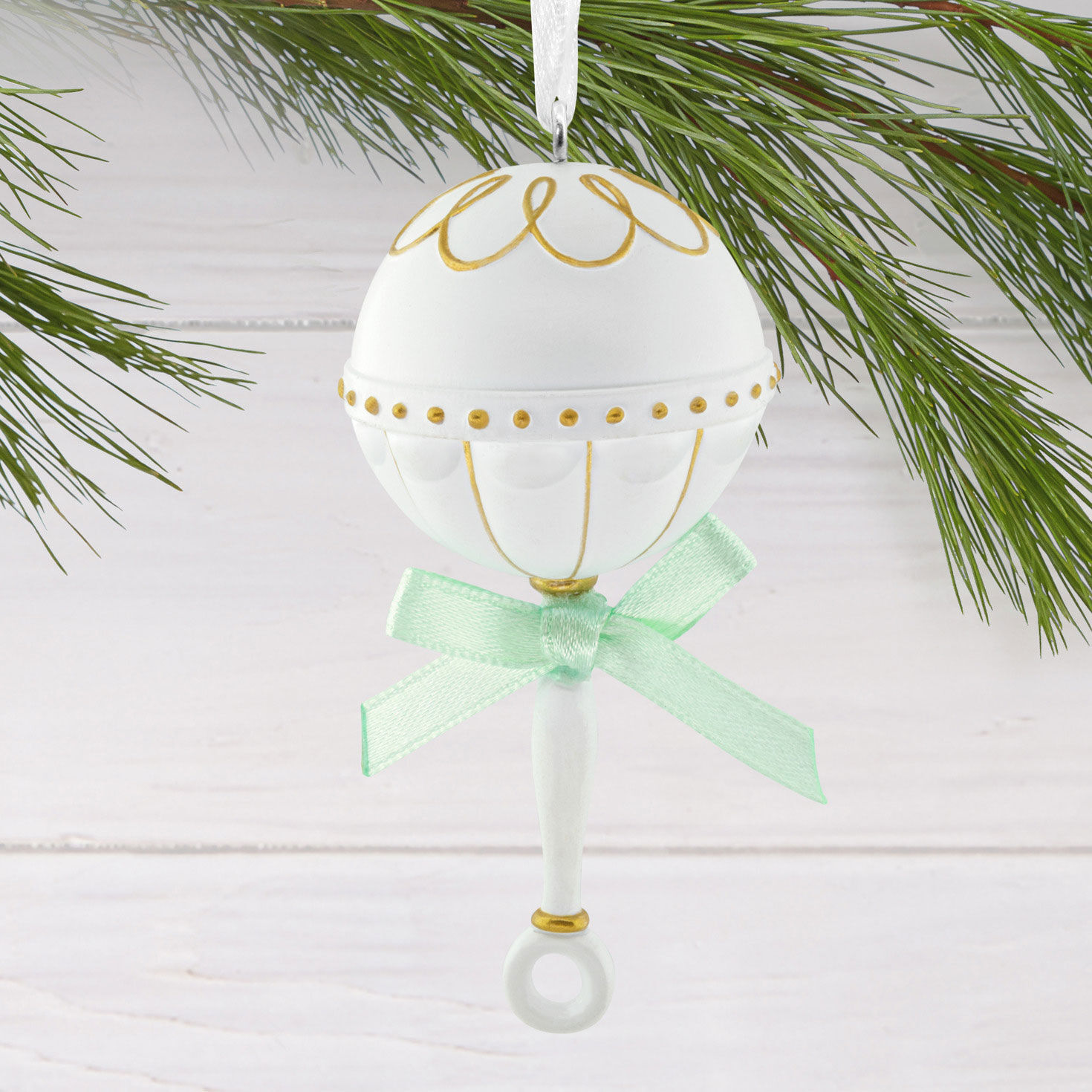 White With Gold Baby Rattle Christmas Ornament hanging on tree image number 2
