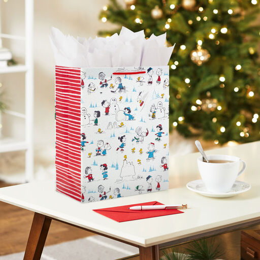 13" Peanuts® Gang Winter Fun Large Christmas Gift Bag, 