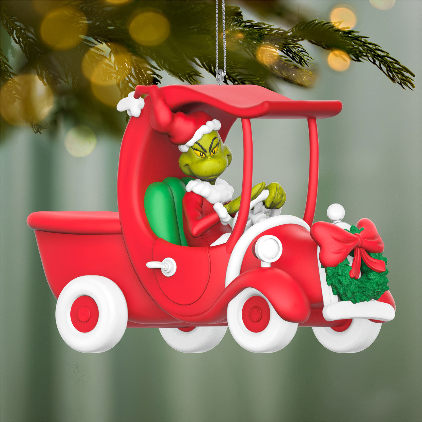 Grinch in Red Car Keepsake Ornament hanging on tree image number 2