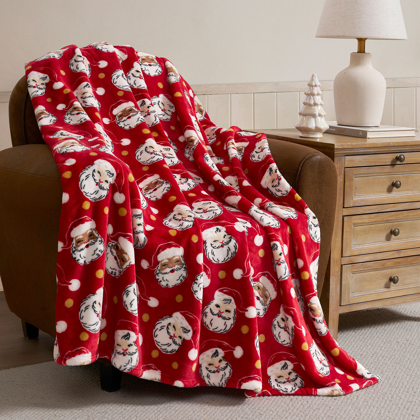 Smiling Santas Plush Fleece Throw Blanket in use image number 2