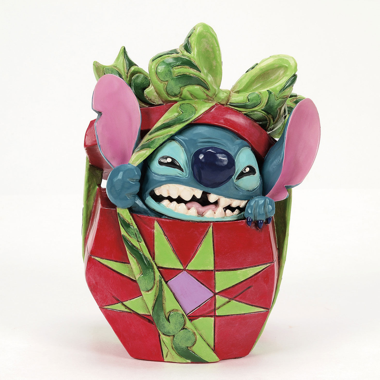 Jim Shore Stitch Popping Out of Gift Figurine front image number 3