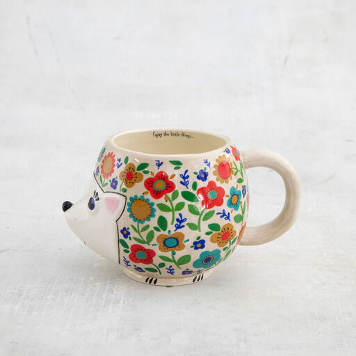 https://www.hallmark.com/dw/image/v2/AALB_PRD/on/demandware.static/-/Sites-hallmark-master/default/dwd6d8be4d/images/finished-goods/products/MUG404/Natural-Life-Floral-Hedgehog-Sculpted-Mug_MUG404_01.jpg?sw=512&sh=512&sm=fit