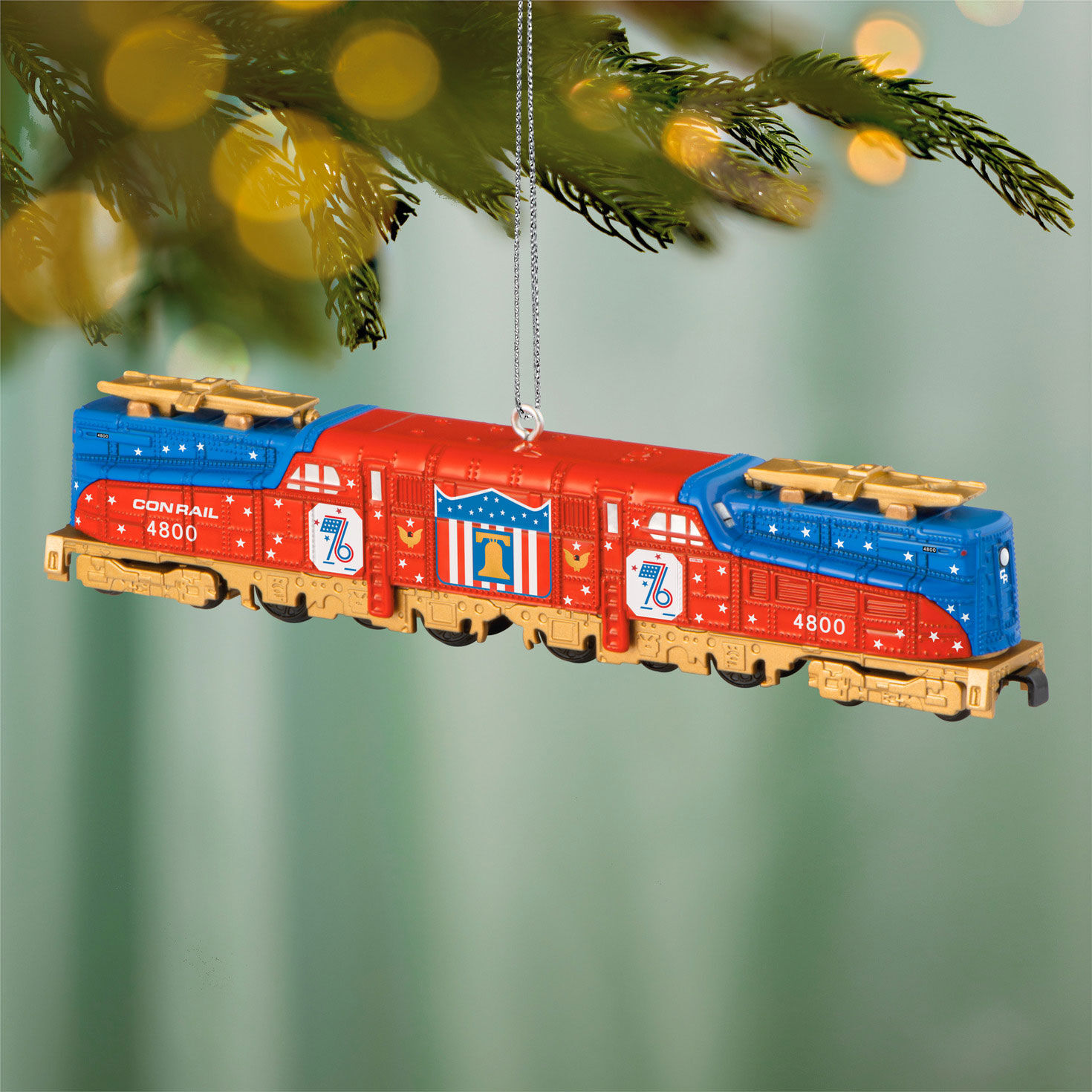 Lionel Red Blue Gold Train Engine Ornament hanging on tree image number 2