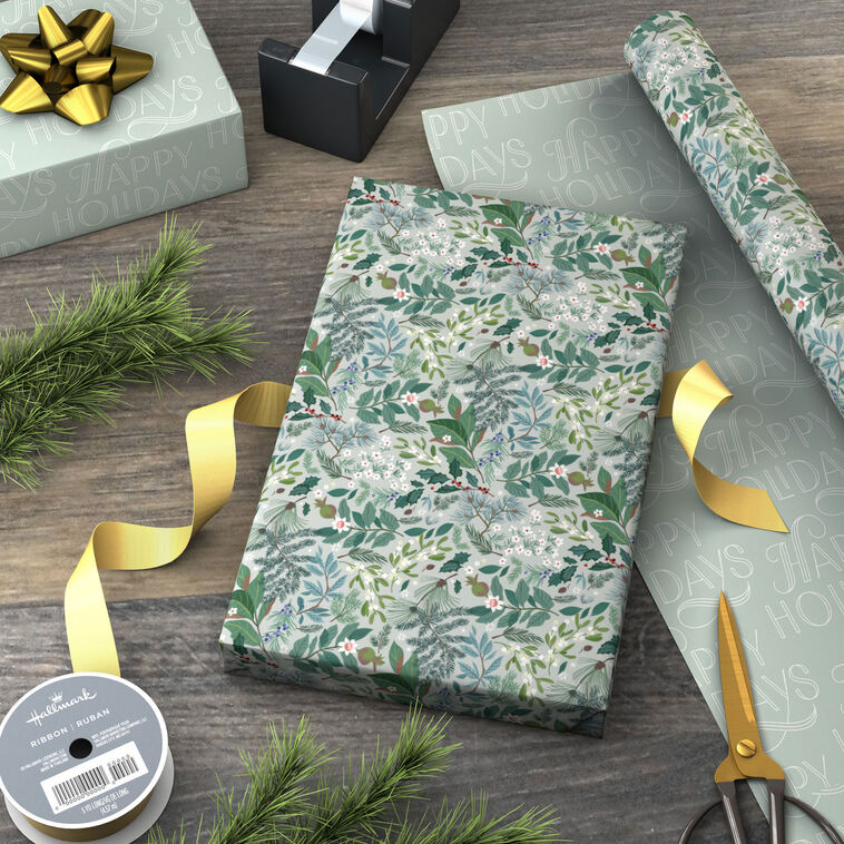 Floral on Blue/Happy Holidays Reversible Gift Wrap in use image number 3