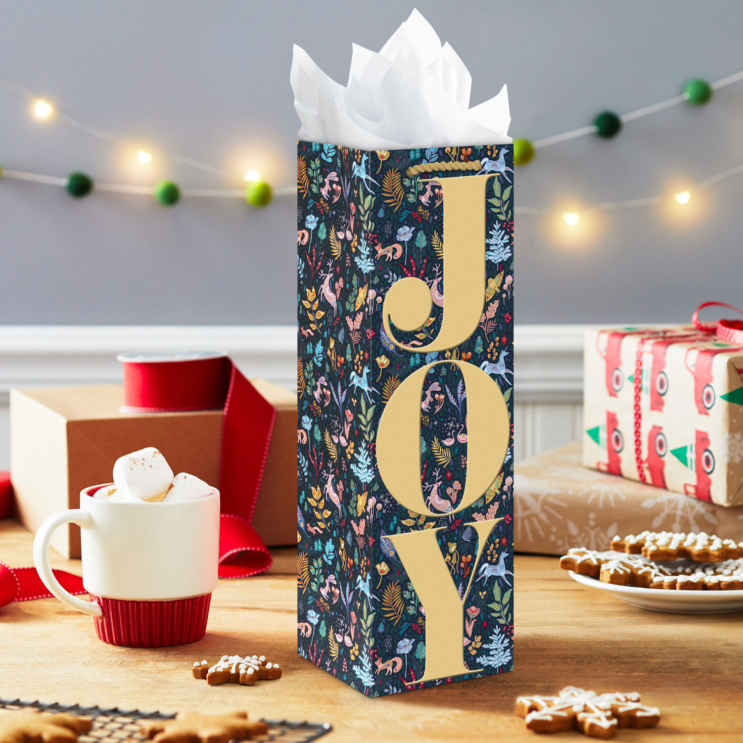 Joy on Navy Floral Holiday Wine Gift Bag in use image number 2