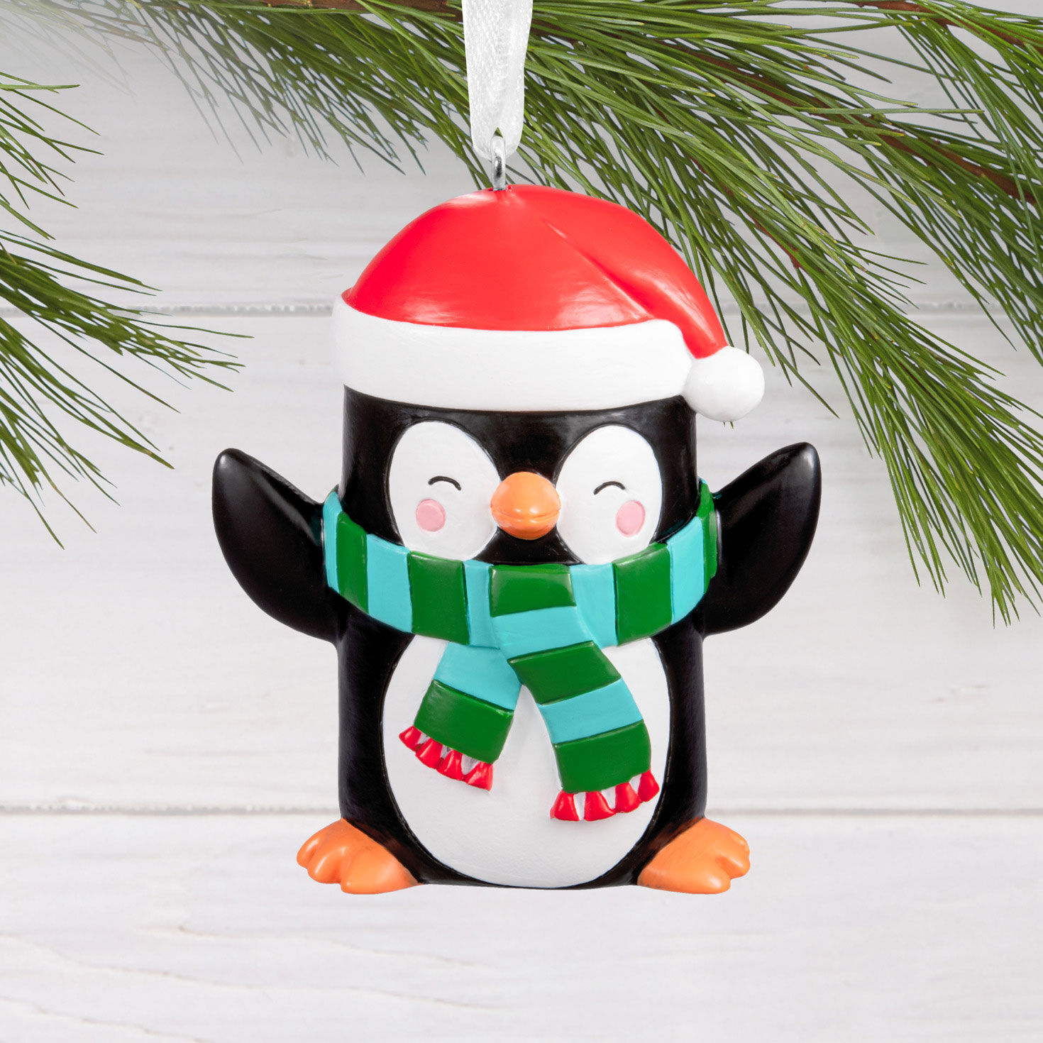 Penguin in Santa Hat Christmas Ornament hanging on tree image number 2