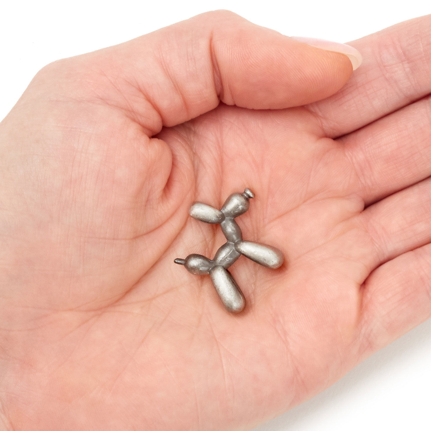Balloon Dog-Shaped Silver Metal Pocket Token item on hand image number 3