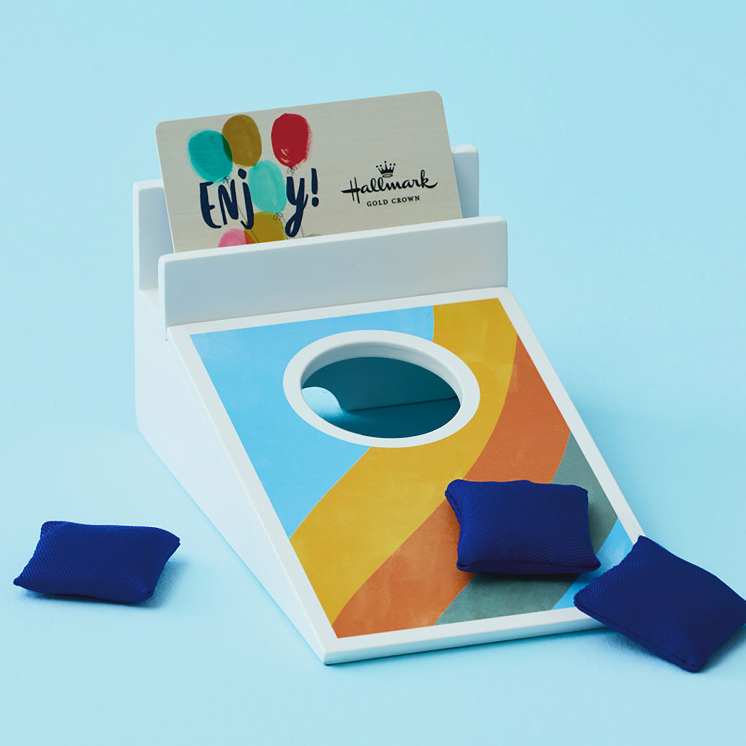 Cornhole Tabletop Game and Phone Holder in use image number 2