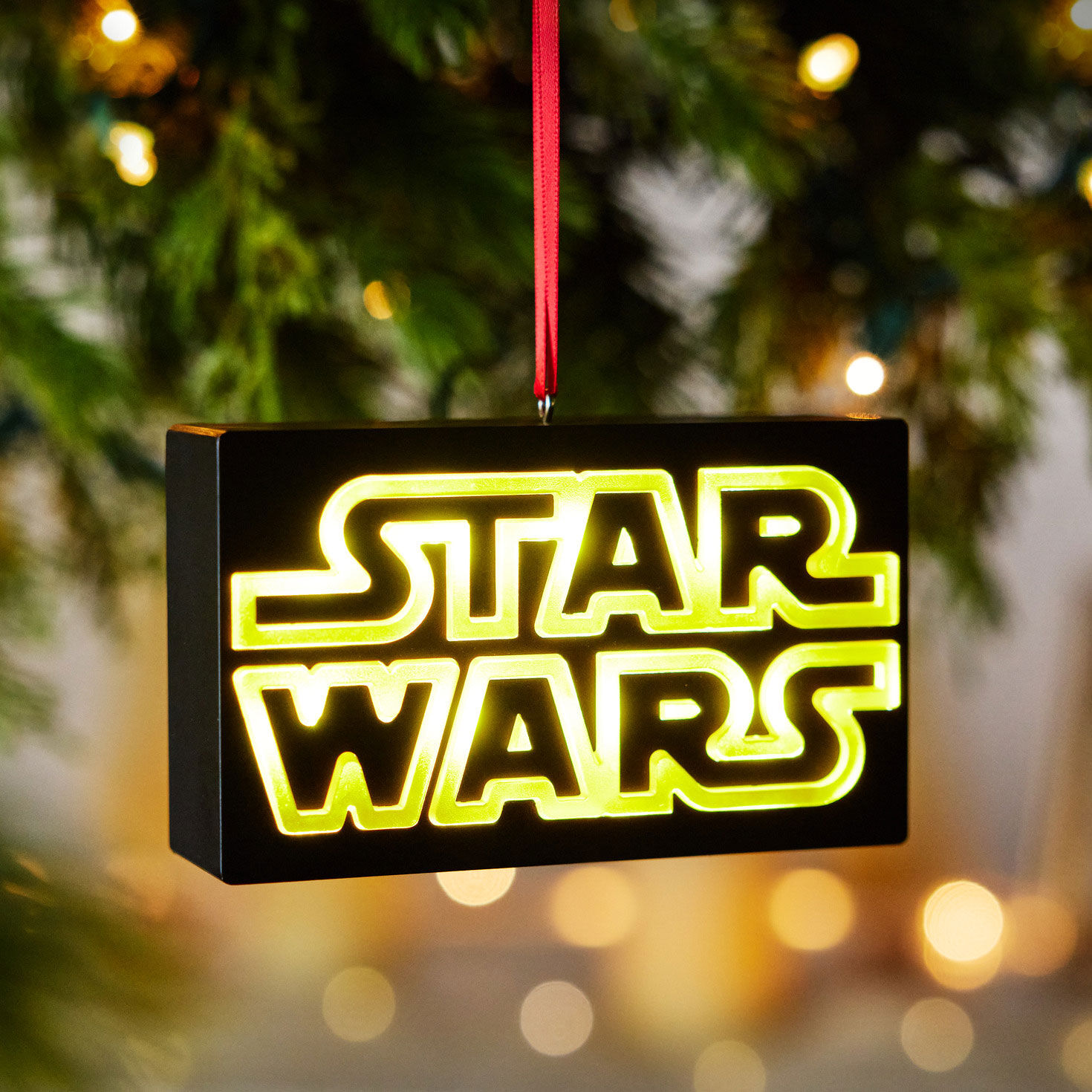Black Yellow Star Wars Sign Keepsake Ornament glowing hanging on tree image number 3