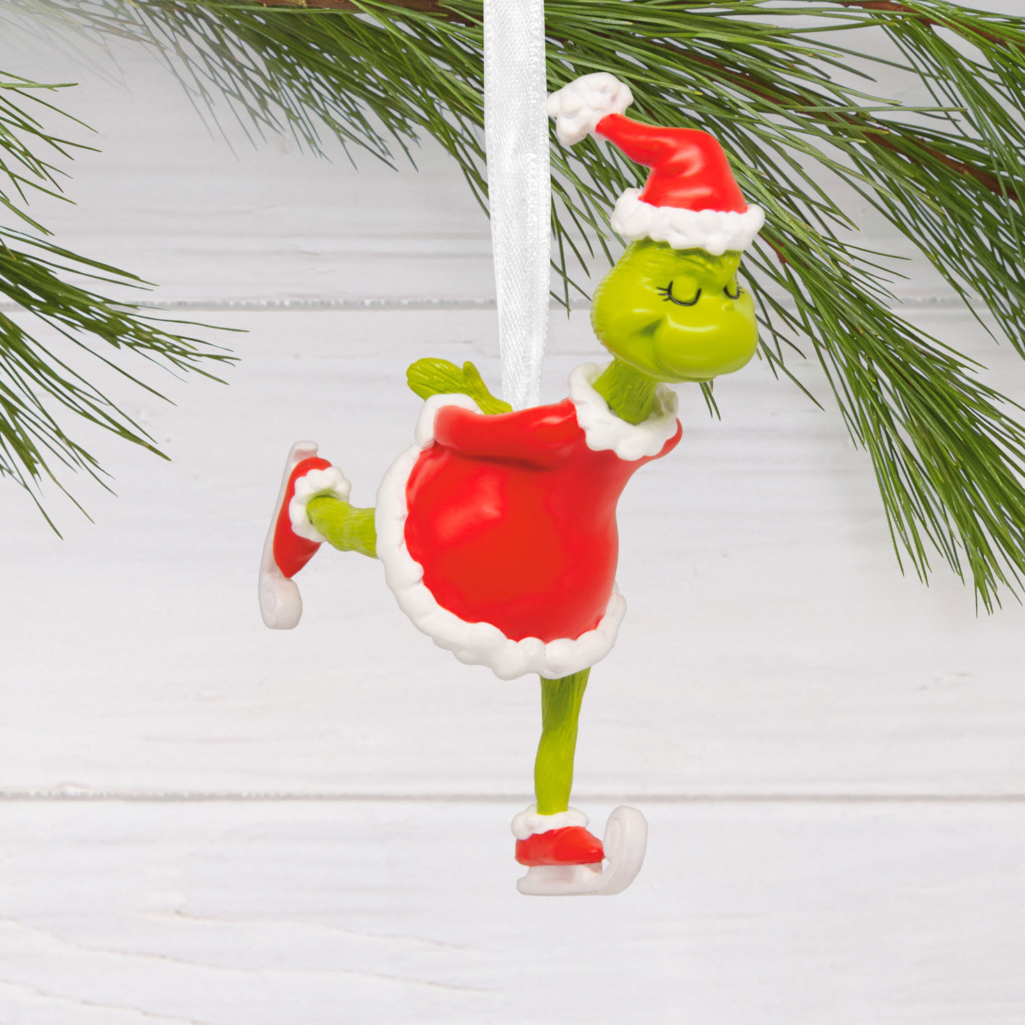 Grinch Ice Skating Christmas Ornament hanging on tree image number 2