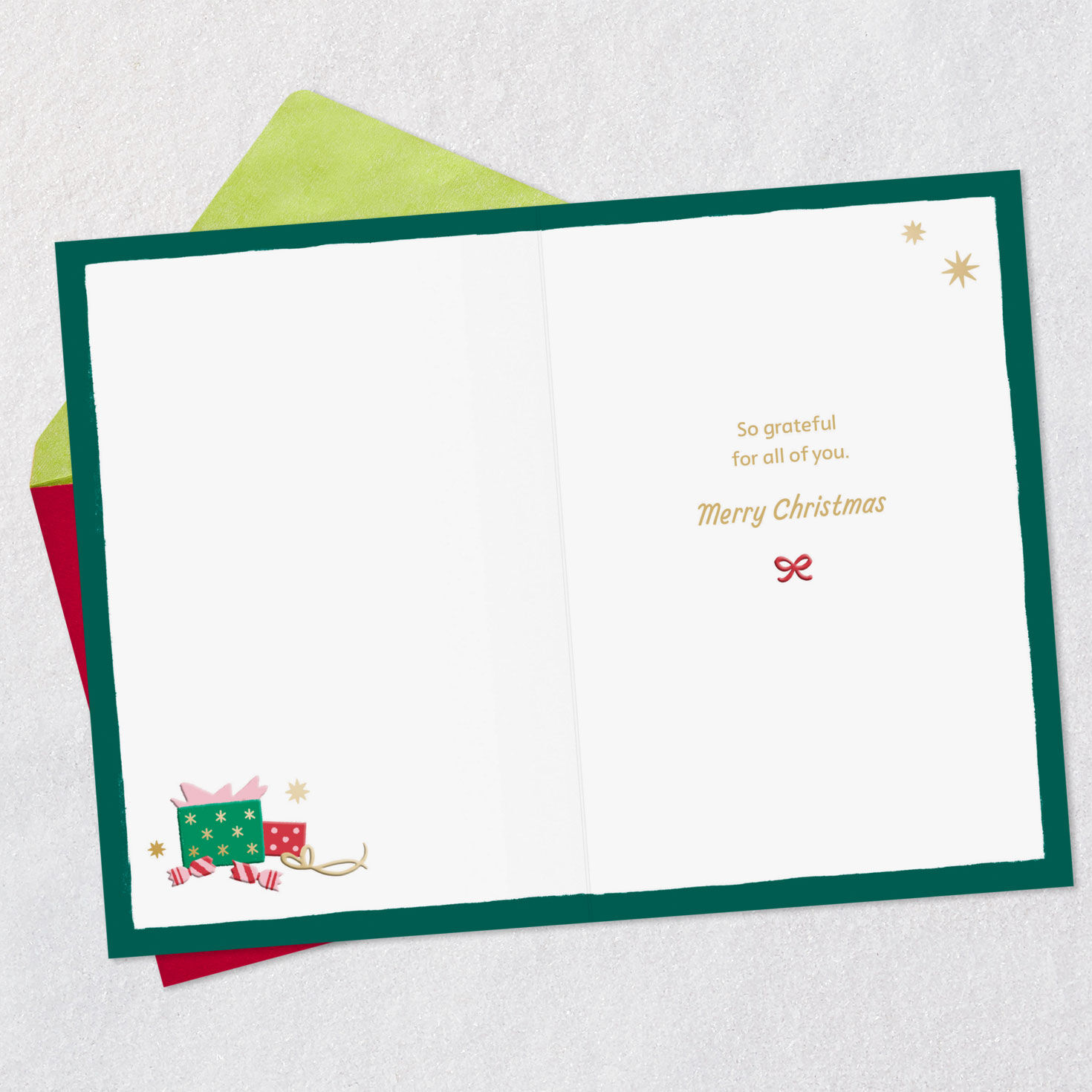 Icons on Green Christmas Card for Granddaughter and Family Open card with envelope image number 3