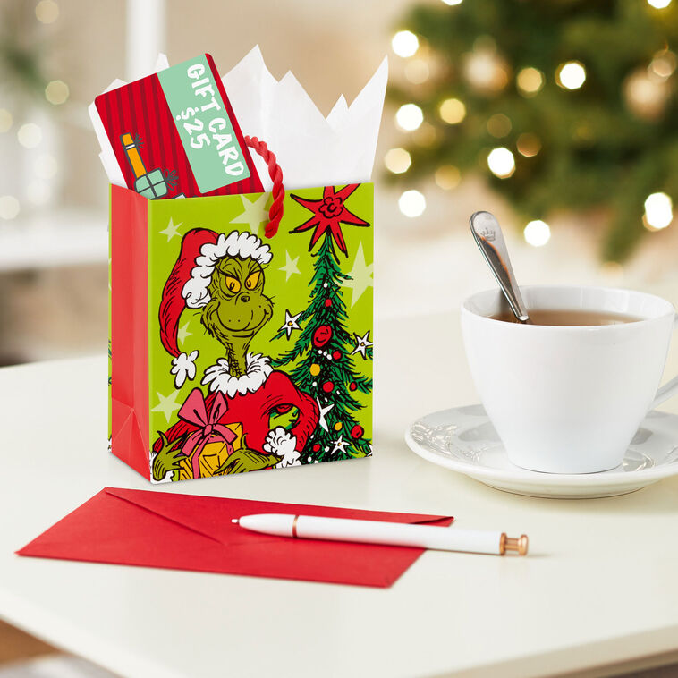 Dr. Seuss's Grinch on Green Gift Card Holder Bag In use image number 2