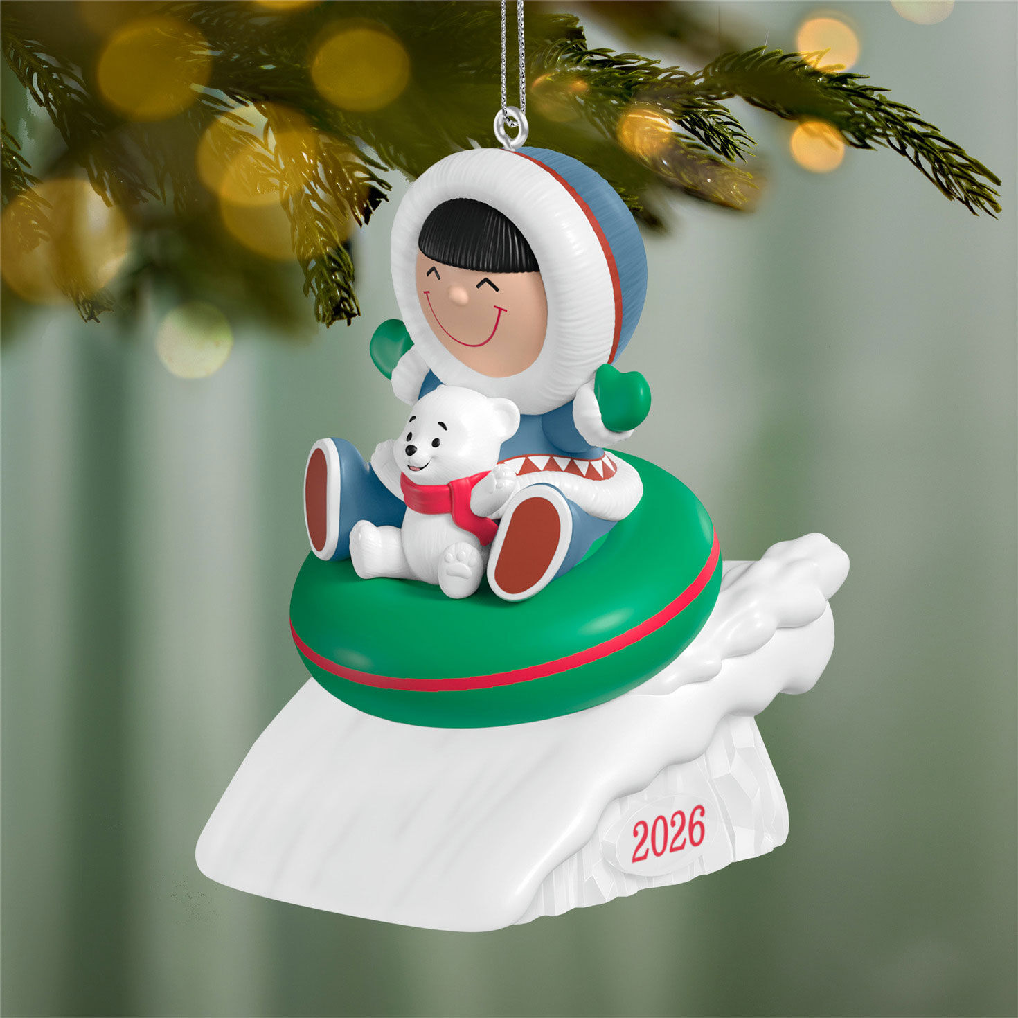 Eskimo Tubing With Bear Keepsake Ornament hanging on tree image number 2