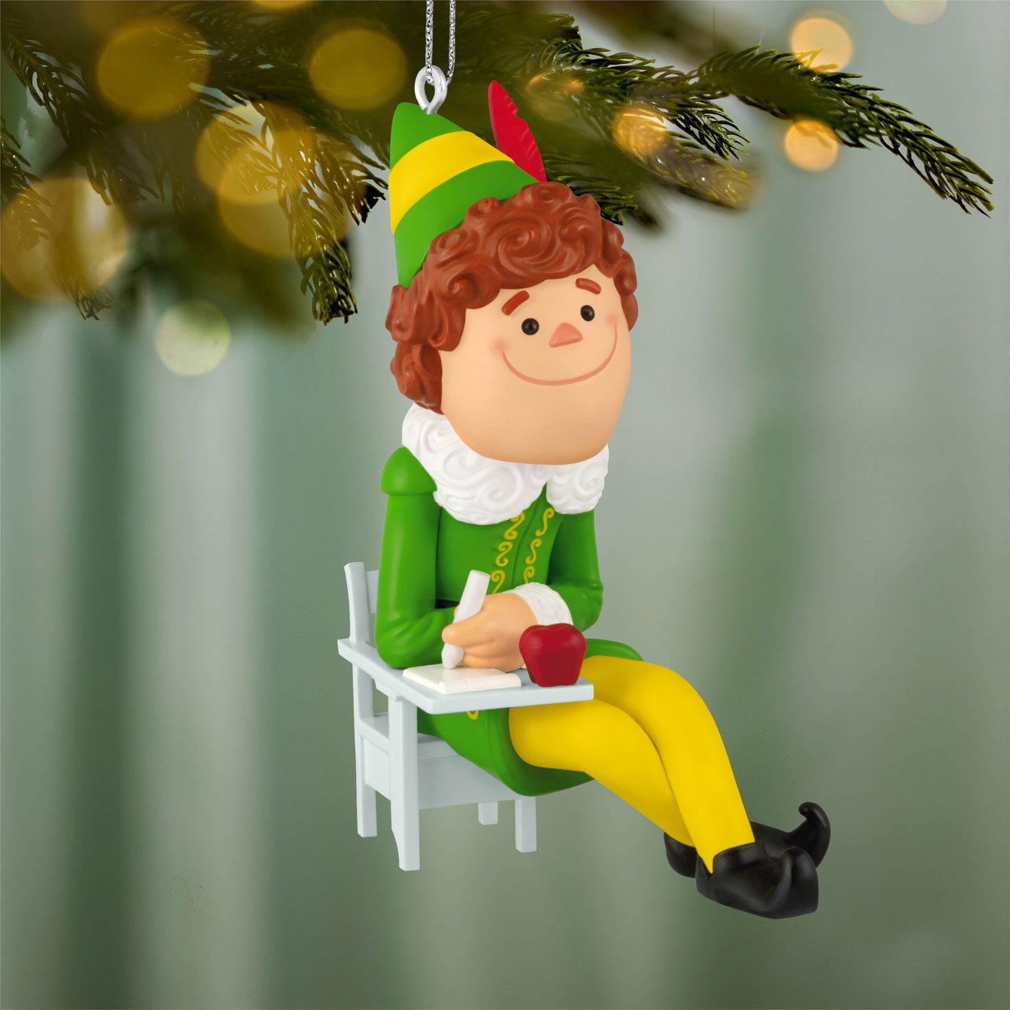 Buddy the Elf Sitting at Desk Keepsake Ornament hanging on tree image number 2