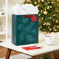 Embossed Pine Branch on Green Large Holiday Gift Bag In Use image number 2